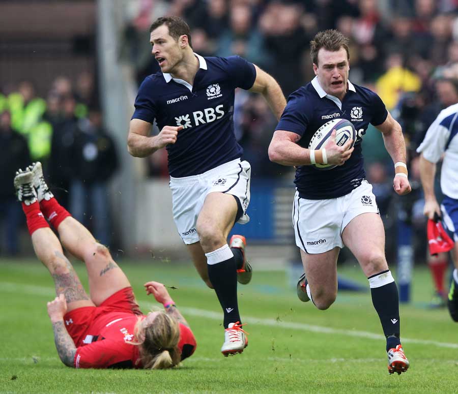 Scotland's Stuart Hogg races away for their first try