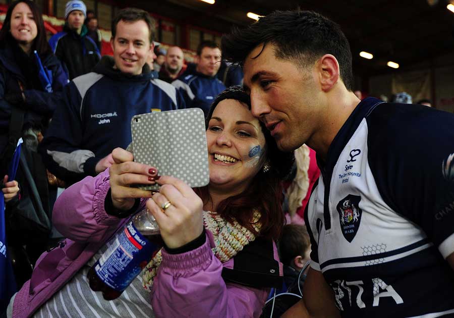 Gavin Henson poses for a photo with a fan after making his Bristol debut