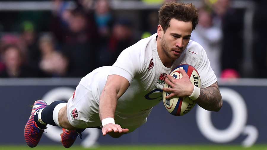 England's Danny Cipriani goes over against Italy