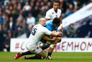 England fullback Mike Brown clashes with Italy's Andrea Masi