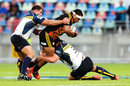Siate Tokolahi of the Chiefs takes on the Brumbies defence