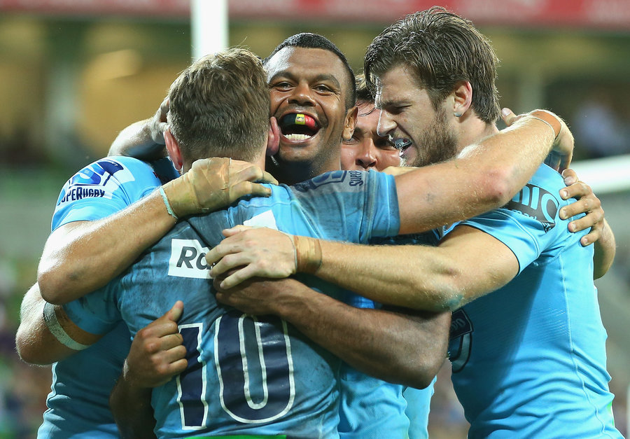 Kurtley Beale celebrates a try with Bernard Foley and Rob Horne