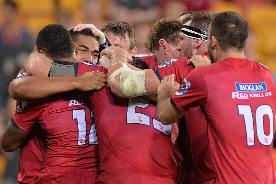 Queensland's Chris Feauai-Sautia celebrates with team-mates but his try was disallowed
