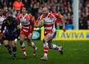 Charlie Sharples charges through to score