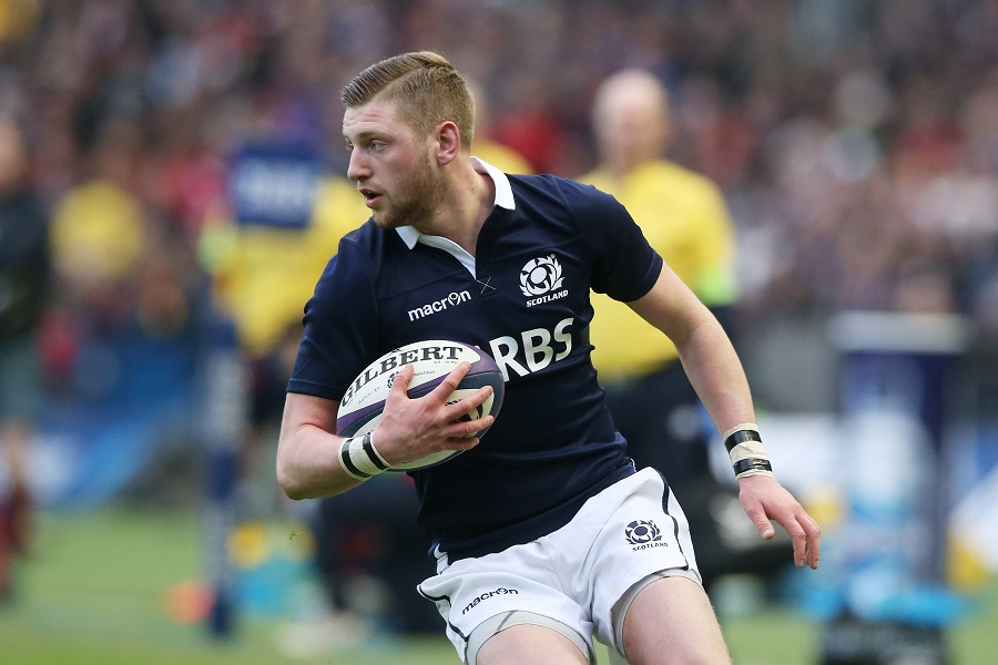 Scotland's Finn Russell looks for a break
