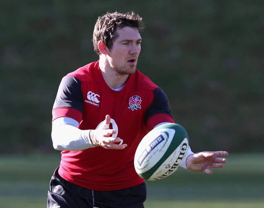 England's Alex Goode passes the ball in training