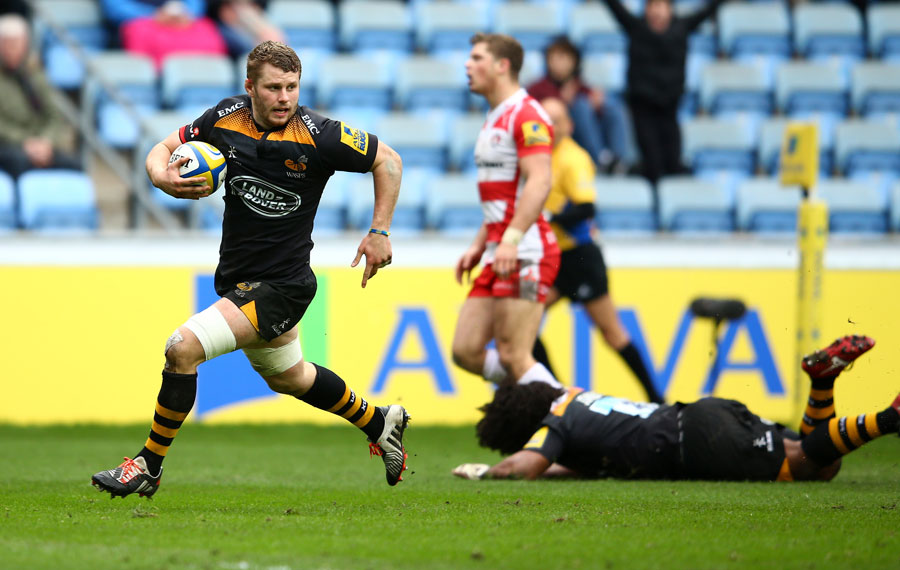 Thomas Young sprints clear to score a try for Wasps