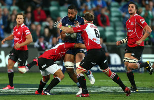 Patrick Tuipuluotu of The Blues takes on the Lions defence, Blues v Lions, Super Rugby, North Harbour Stadium, Auckland, March 7, 2015