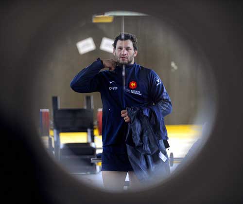 France skipper Lionel Nallet seen through a weight during an indoor training session