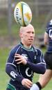 Ireland scrum-half Peter Stringer spins out a pass during training