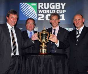  Martin Snedden, CEO of Rugby New Zealand 2011 Ltd, Murray McCully, Minister of the Rugby World Cup, Mike Miller, Managing Director of Rugby World Cup Limited and Jock Hobbs, Chairman of the New Zealand Rugby Union, stand with the Rugby World Cup after the announcement of the pool match venues for the Rugby World Cup 2011, Eden Park, Auckland, New Zealand, March 12, 2009