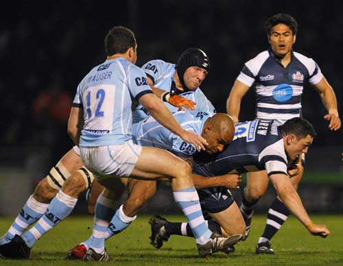 Bristol's Neil Brew is tackled by the Leicester defence