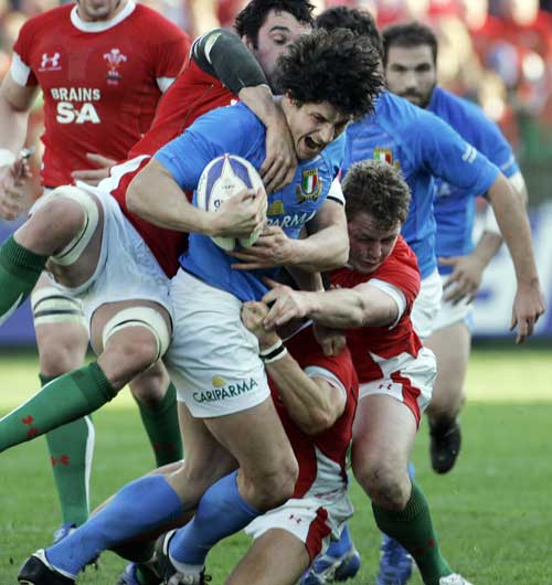 Italy flanker Alessandro Zanni powers through the Wales defence