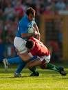 Gonzalo Canale is tackled by James Hook 