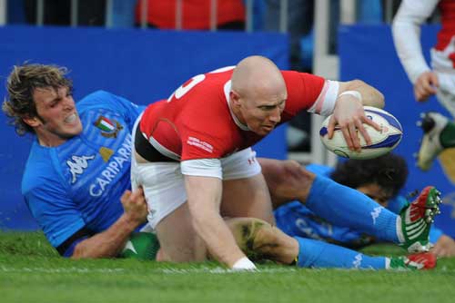Wales centre Tom Shanklin reaches out to score