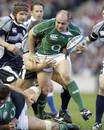 Ireland's ROry Best is tackled by Scotland's Ross Ford