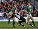 Ireland's Brian O'Driscoll is tackled by Scotland's Phil Godman
