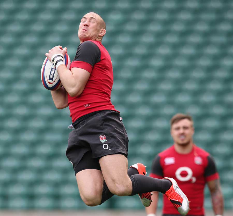 England's Mike Brown takes a high ball in training
