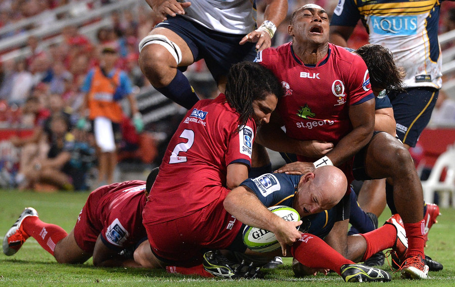 Stephen Moore of the Brumbies scores a try