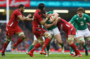 Ireland's Cian Healy is stopped by Luke Charteris and the Wales defence