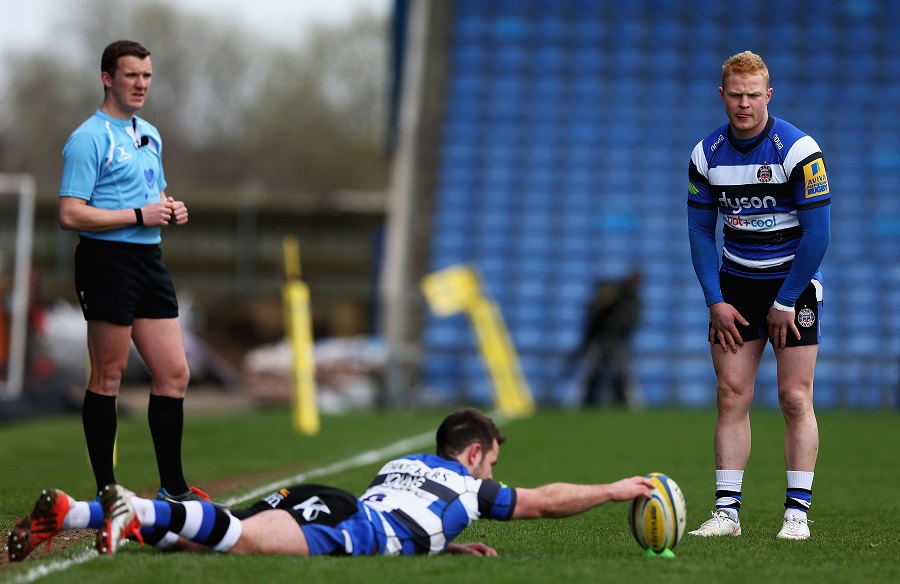 Micky Young holds the ball for his Bath team-mate Tom Homer
