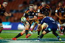 The Chiefs' Sam Cane passes the ball