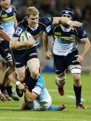 The Brumbies' David Pocock breaks a tackle, Brumbies v Cheetahs, Super Rugby GIO Stadium, Canberra, April 4, 2015
