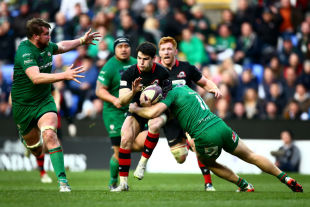 Sam Hidalgo-Clyne of Edinburgh is tackled by Alex Lewington of London Irish during the European Rugby Challenge Cup Quarter Final between London Irish and Edinburgh Rugby at the Madejski Stadium on April 5, 2015 in Reading, England. (Photo by Jordan Mansfield/Getty Images)