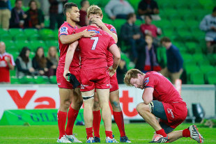The Reds' Liam Gill is consoled by team-mates, Rebels v Reds, Melbourne, April 3, 2015