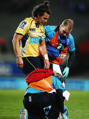 The Brumbies' Matt Toomua is forced from the field, Blues v Brumbies, Auckland, April 10, 2015