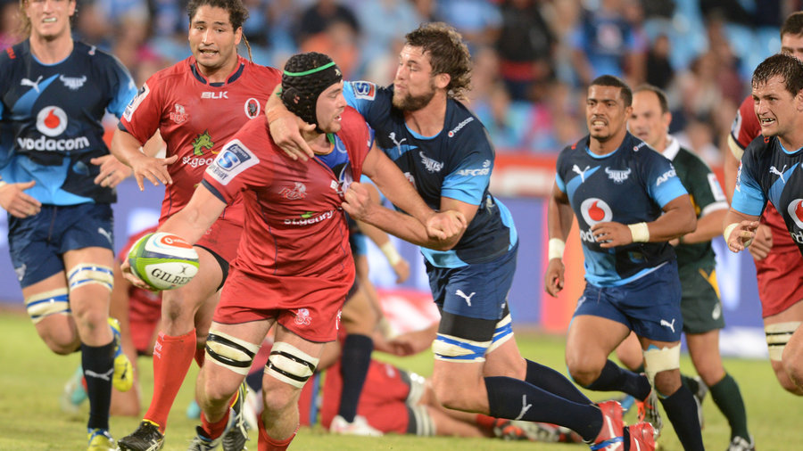 Liam Gill of the Queensland Reds is taken down by the Bulls' defence, Bulls v Reds, Super Rugby, Loftus Versfeld, Pretoria, April 11, 2015
