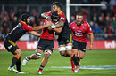 Jordan Taufua of the Crusaders is tackled by Liam Messam of the Chiefs 
