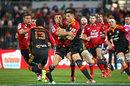 Sonny Bill Williams of the Chiefs takes on the Crusaders' defence 