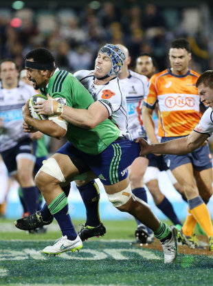 David Pocock of the Brumbies wraps Nasi Manu of the Highlanders in a tackle, Brumbies v Highlanders, Super Rugby, GIO Stadium, Canberra, April 24, 2015