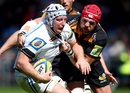 Thomas Waldrom of Exeter Chiefs is challanged by James Haskell of Wasps