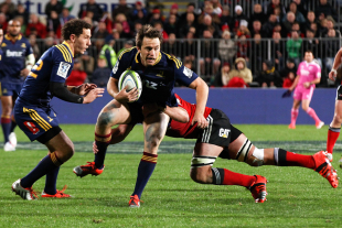 The Highlaners' Ben Smith breaks a tackle, Crusaders v Highlanders, Super Rugby, AMI Stadium, Christchurch, April 11, 2015