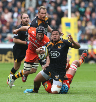 COVENTRY, ENGLAND - MAY 09: Alapati Leiua of Wasps is tackled by Graham Kitchener during the Aviva Premiership match between Wasps and Leicester Tigers at The Ricoh Arena on May 9, 2015 in Coventry, England.  (Photo by David Rogers/Getty Images)