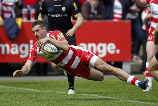GLOUCESTER, ENGLAND - MAY 09: Jonny May of Gloucester dives over to score a try during the Aviva Premiership match between Gloucester Rugby and London Irish at Kingsholm Stadium on May 9, 2015 in Gloucester, England. (Photo by Steve Bardens/Getty Images)