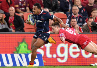 Sefanaia Naivalu of the Rebels breaks away from Reds' James O'Connor, Reds v Rebels, Super Rugby, Suncorp Stadium, Brisbane, May 15, 2015
