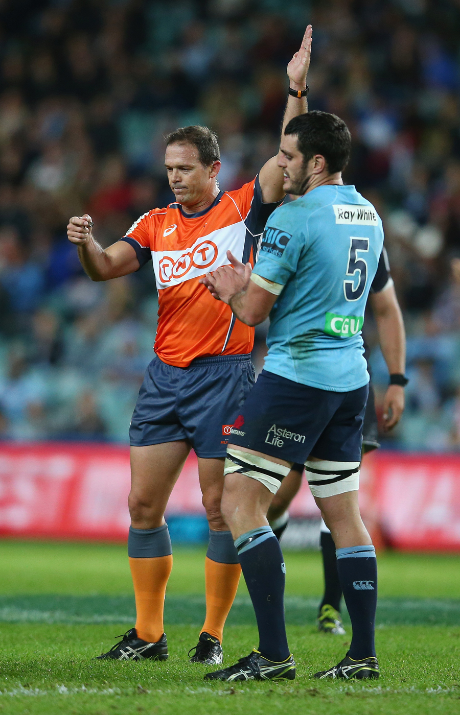 Referee Rohan Hoffmann awards a penalty against the Sharks