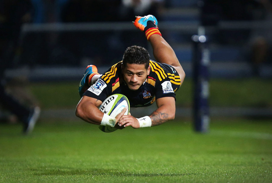 Augustine Pulu of the Chiefs dives over the whitewash