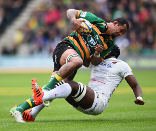 NORTHAMPTON, ENGLAND - MAY 23: Samu Manoa of Northampton Saints is tackled by Maro Itoje of Saracens during the Aviva Premiership Play Off Semi Final between Northampton Saints and Saracens at Franklin's Gardens on May 23, 2015 in Northampton, England.  (Photo by Laurence Griffiths/Getty Images)