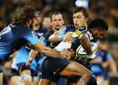 Henry Speight of the Brumbies is tackled 