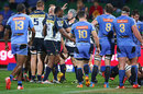 The Brumbies' David Pocock is congratulated after scoring a try