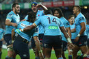 The Waratahs celebrate Jacques Potgieter's try