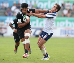 Akira Ioane of New Zealand holds off Damian Penaud to score a try, New Zealand v France, Semi-Final, World Rugby U20 Championship, Italy, June 15, 2015