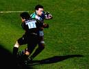 Harlequins centre Gonzalo Tiesi is tackled