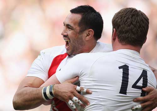 England centre Riki Flutey is congratulated by Mark Cueto after scoring a try