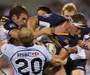 The Brumbies' Ben Alexander takes on the Waratahs' defence 