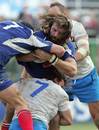 France's Sebastien Chabal is shackled by the Italy defence
